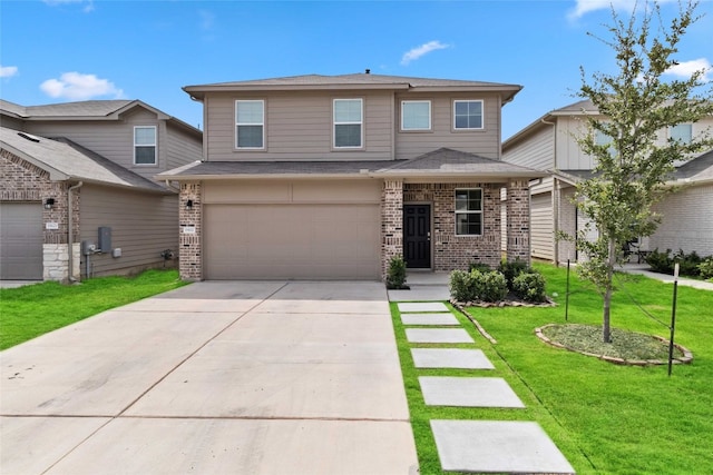 view of front of property featuring a garage and a front yard