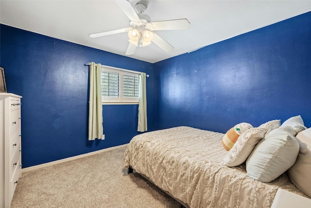 bedroom featuring ceiling fan and carpet floors