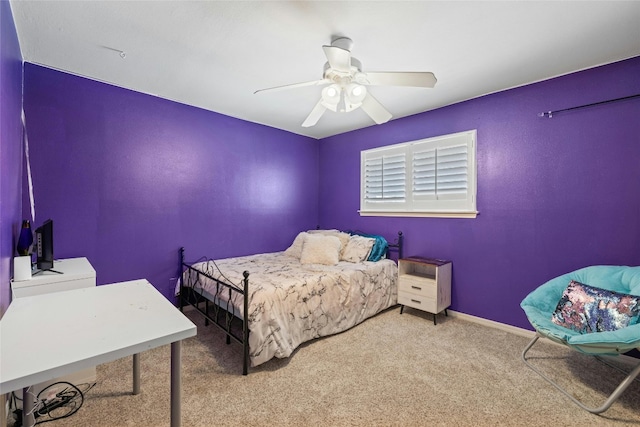 bedroom with ceiling fan and carpet floors