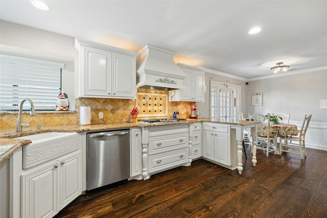 kitchen featuring white cabinets, kitchen peninsula, appliances with stainless steel finishes, custom range hood, and dark hardwood / wood-style flooring