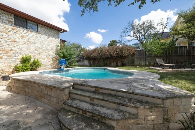 view of pool featuring a patio area