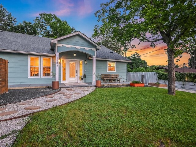 view of front of home featuring a yard