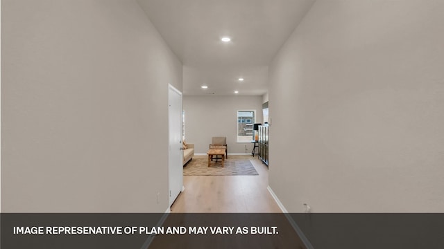 hallway featuring light wood-type flooring