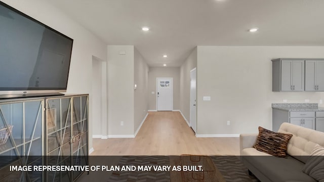 unfurnished living room with light hardwood / wood-style floors