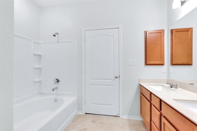 bathroom with tile patterned floors,  shower combination, and vanity