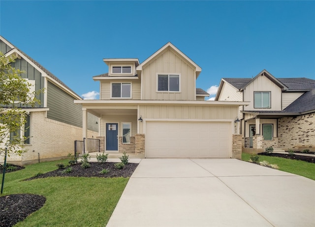 view of front facade featuring covered porch, a front yard, and a garage