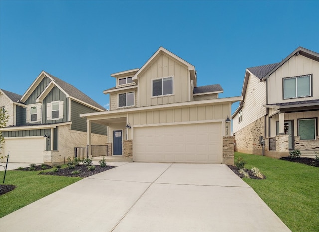 craftsman-style house featuring a front yard and a garage