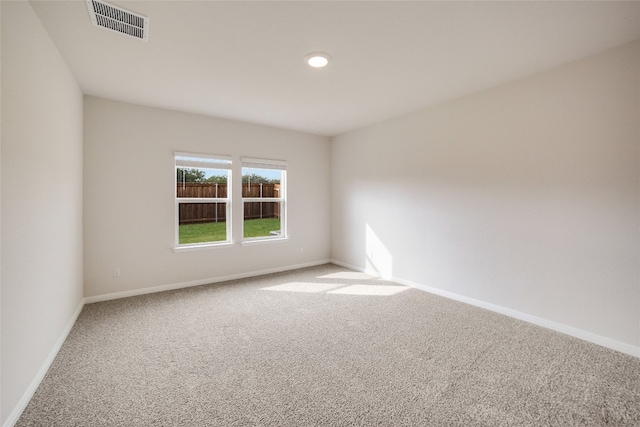 view of carpeted spare room