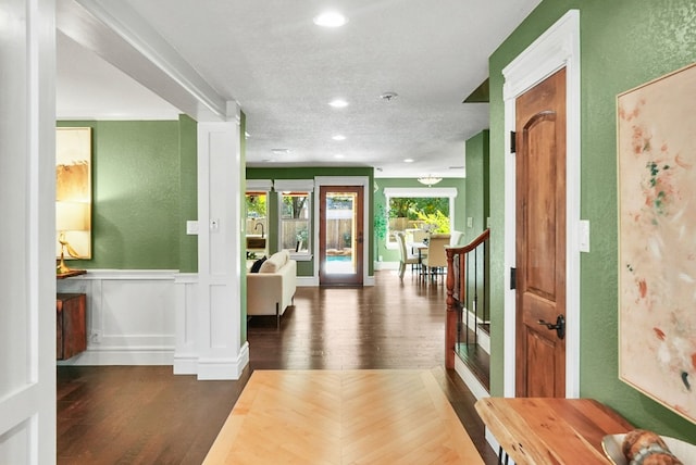 corridor featuring dark hardwood / wood-style floors