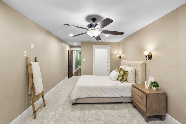 carpeted bedroom with recessed lighting, baseboards, and ceiling fan