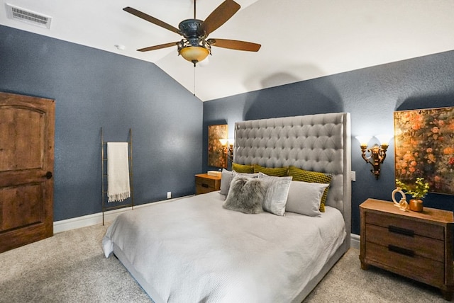 bedroom featuring a ceiling fan, visible vents, carpet floors, baseboards, and vaulted ceiling