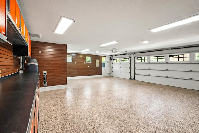 garage with wood walls