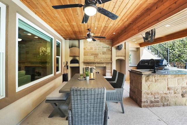 view of patio / terrace featuring outdoor dining space, area for grilling, ceiling fan, and a grill