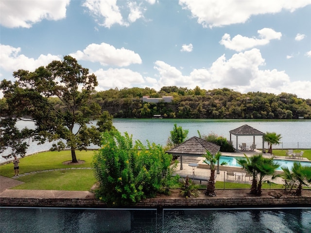 property view of water with a gazebo