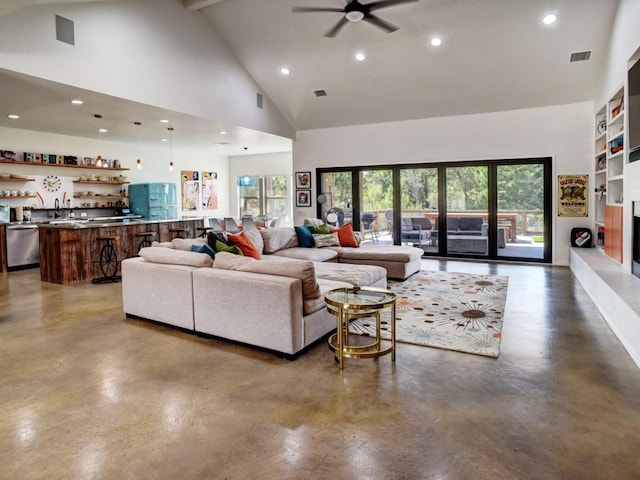 living room with high vaulted ceiling, concrete flooring, ceiling fan, and a healthy amount of sunlight