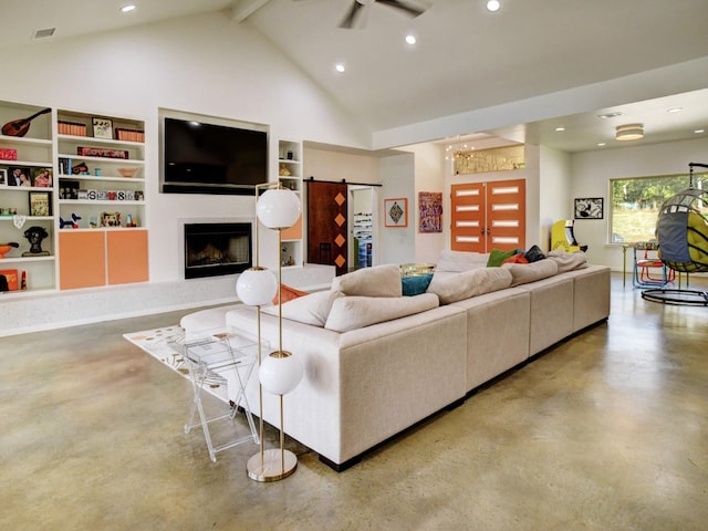 living room with built in shelves, beam ceiling, high vaulted ceiling, concrete flooring, and a barn door