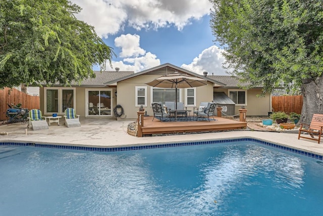 view of pool with a deck