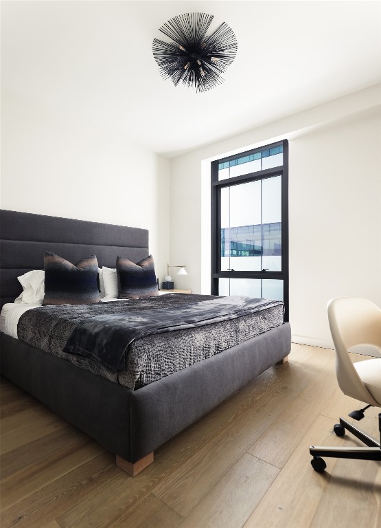 bedroom featuring hardwood / wood-style floors