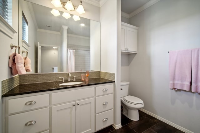 bathroom featuring backsplash, vanity, toilet, crown molding, and a shower with curtain