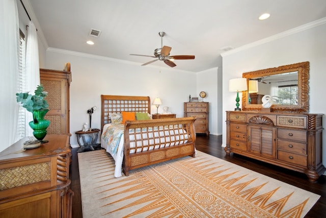 bedroom featuring crown molding and hardwood / wood-style floors