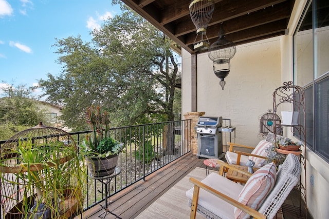 balcony featuring area for grilling