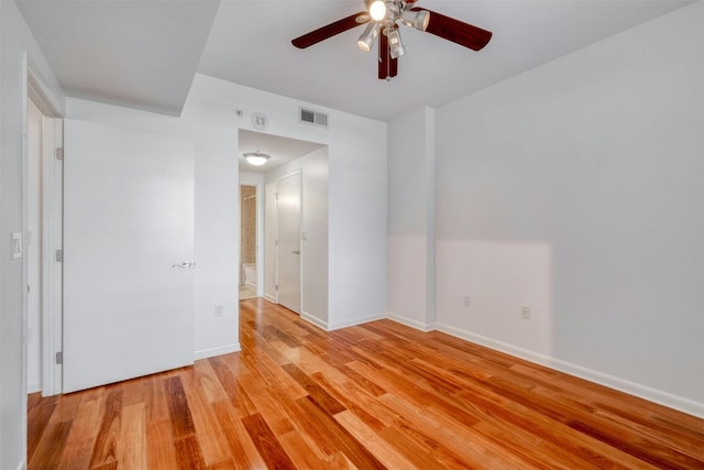 unfurnished room with light hardwood / wood-style flooring and ceiling fan