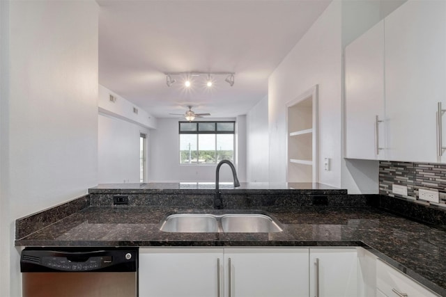 kitchen with ceiling fan, sink, and white cabinetry