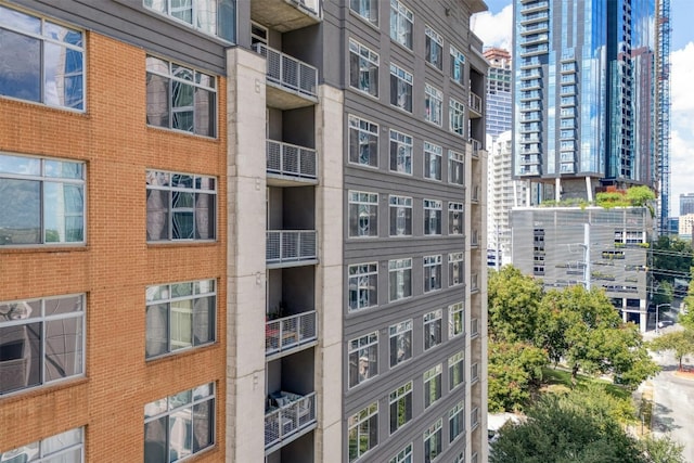 54 Rainey St Unit 1015, Austin, TX 78701 - view of apartment building / complex featuring a view of city