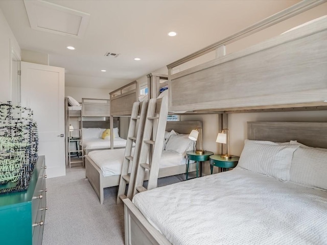 19601 Flying J Blvd Unit 15, Spicewood, TX 78669 - bedroom with light colored carpet, recessed lighting, and attic access