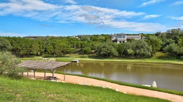 view of community with a water view