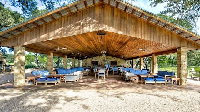 view of patio with ceiling fan and an outdoor hangout area