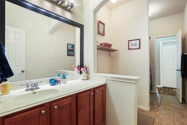 bathroom with vanity and tile patterned flooring