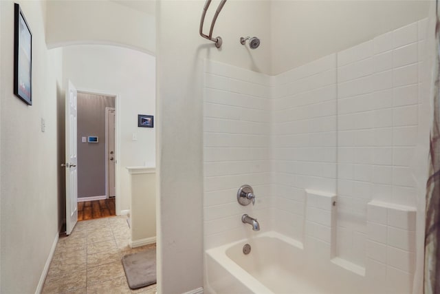 bathroom featuring shower / bathing tub combination and tile patterned floors