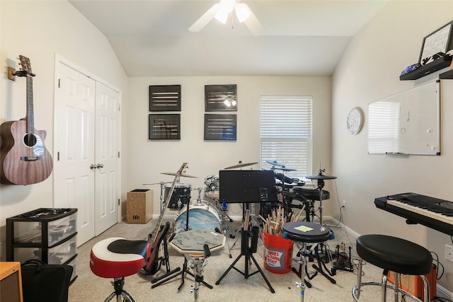 rec room featuring ceiling fan, light colored carpet, and vaulted ceiling