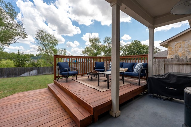 wooden terrace with area for grilling, a yard, and an outdoor hangout area