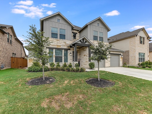 craftsman-style home featuring a front lawn and a garage