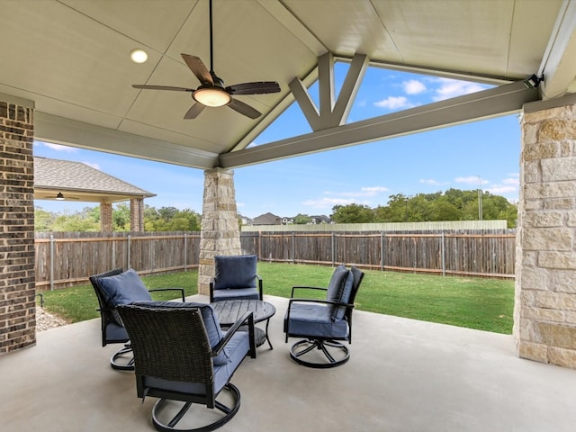 view of patio featuring ceiling fan