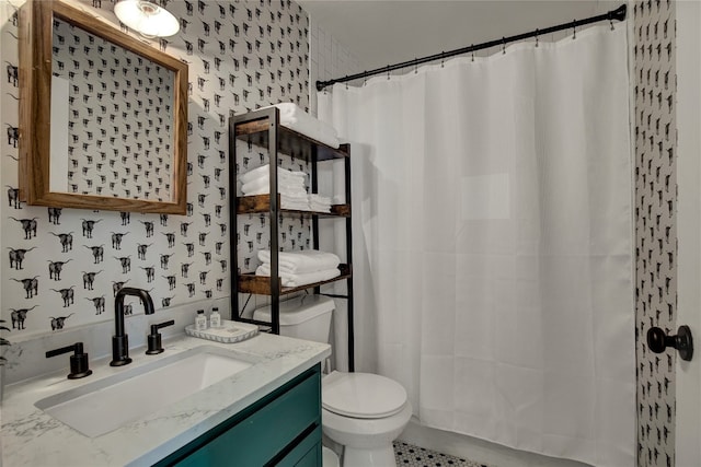 bathroom with tile patterned flooring, vanity, toilet, and a shower with curtain