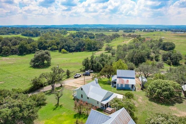 birds eye view of property featuring a rural view