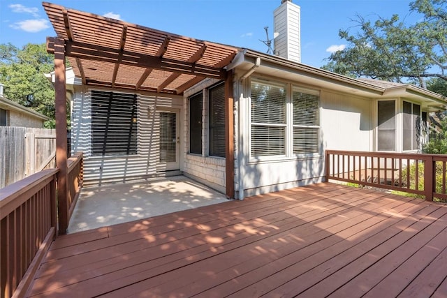 wooden deck with a pergola