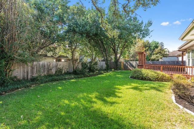 view of yard featuring a deck