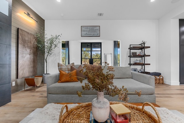 living room with light hardwood / wood-style floors