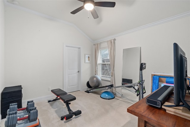 workout room with vaulted ceiling, ceiling fan, carpet flooring, and crown molding