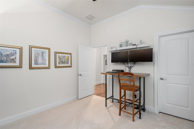 carpeted office space featuring lofted ceiling and crown molding