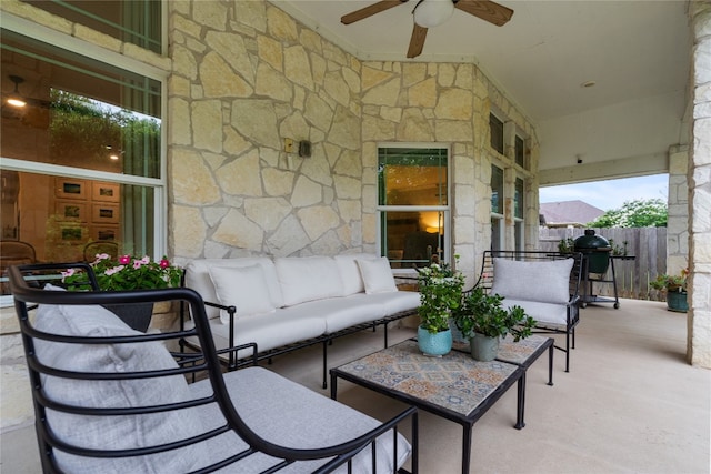 view of patio / terrace featuring ceiling fan and an outdoor hangout area