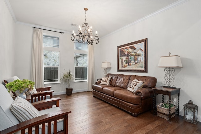 living room featuring a notable chandelier, crown molding, and dark hardwood / wood-style flooring