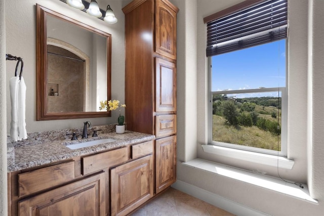 4408 Blacksmith Cv, Spicewood, TX 78669 - bathroom with vanity and tile patterned floors