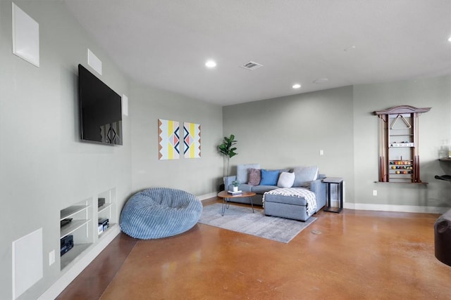 4408 Blacksmith Cv, Spicewood, TX 78669 - living room featuring concrete flooring, recessed lighting, and built in features