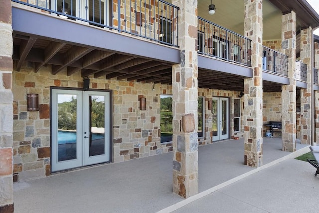 4408 Blacksmith Cv, Spicewood, TX 78669 - patio / terrace with french doors and a patio area