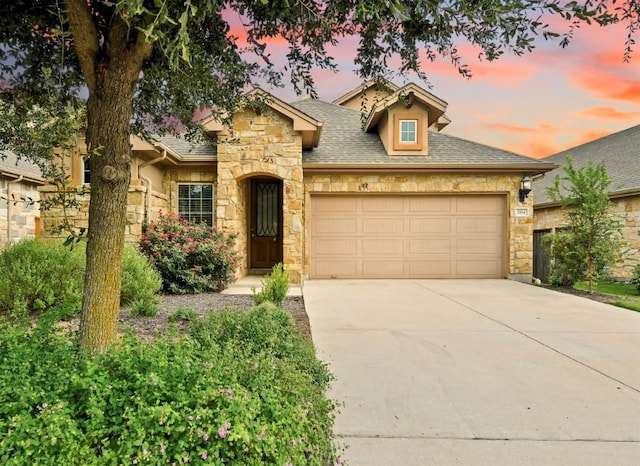 view of front of home with a garage